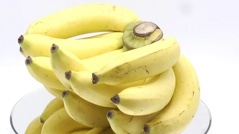 Bananas rotating on white background Stock Footage 124903914