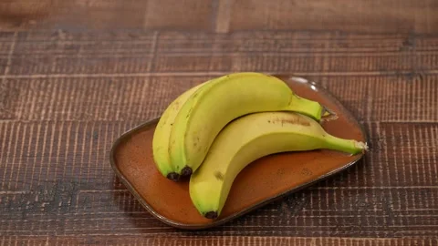 Bananas under studio light Stock Footage 183592655