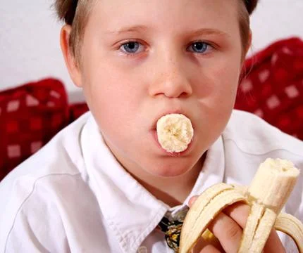 Banane essen Stock Photos