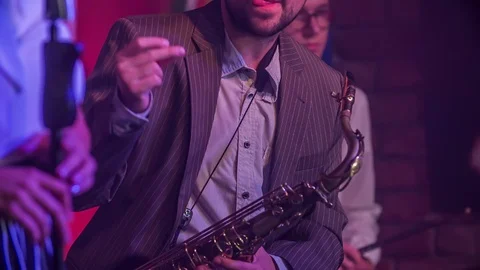 Band in a bar is making sure that the atmosphere is great Stock Footage 112196879