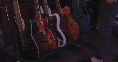 Band Instruments - guitar rack Video stock 249347879