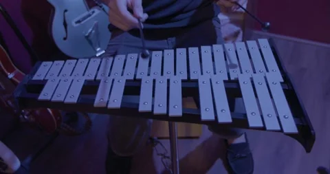 Band Instruments - playing a glockenspiel Stock Footage 249354477