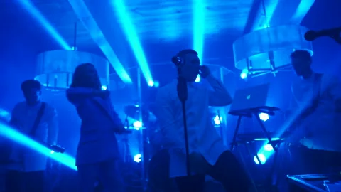 Band performing on stage in blue light Video stock 149600658