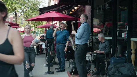 A Band Performs Outside Of A New York City Restaurant Stock Footage 248998186