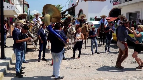 Band playing, people dancing on Mexican street Stock Footage 81154945