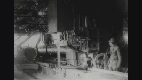 Band saw cuts log into rough lumber - 1918 Stock Footage 83663448