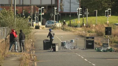 Band Setting Up Equipment &amp; Drum Set in Street HD File Stock Footage 10680945
