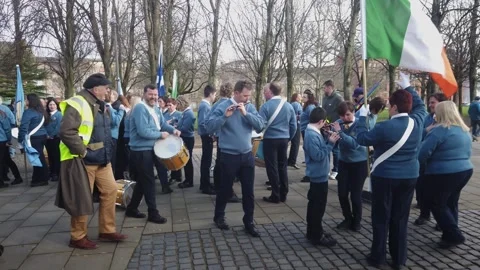 A band warming up before a St. Patrick’s Parade in Glasgow Green. Video stock 335320861