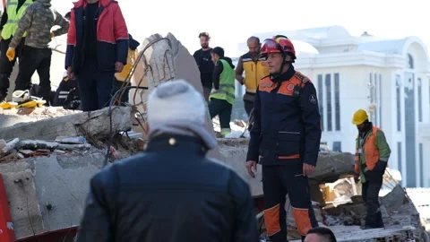 Bandaged Survivor Watching Rubble Work After Earthquake, February 8, 2023, Hatay Video stock 336520617