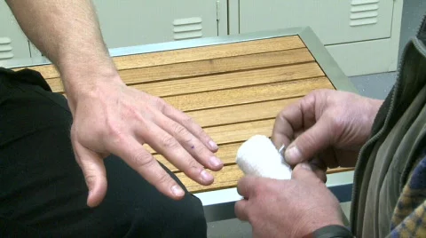 Bandaging arm Stock Footage 772758
