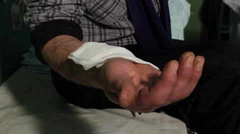 Bandaging arm. Medic technician putting bandage on injury hand. Stock Footage 34967083
