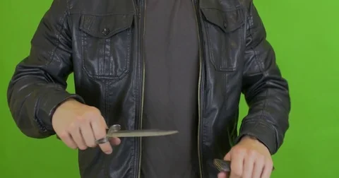 Bandit keeps shaving with a knife blade Stock Footage 75910458