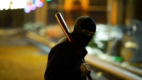 Bandit In Park At Night. Thug. Stockbeeldmateriaal 98930438