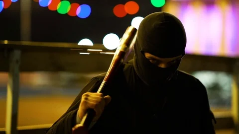 Bandit In Park At Night. Thug. Stock-Footage 98930751