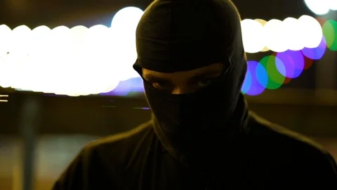 Bandit In Park At Night. Thug. Stock Footage 98930757