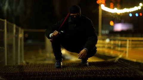 Bandit In Park At Night. Thug. Stock-Footage 98932201