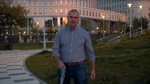 Bandit threatening with a chain Stock Footage 114431676