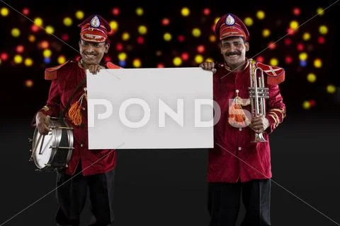 Bandmasters Holding A White Board