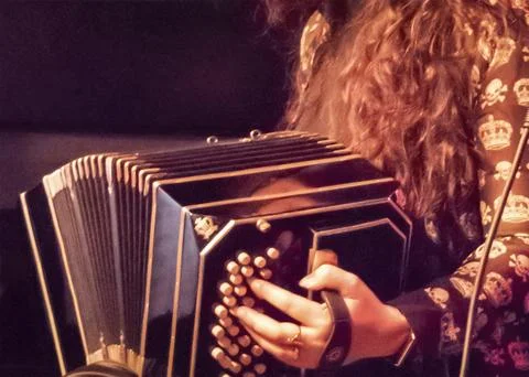 Bandoneon players during tango performance Stock Photos