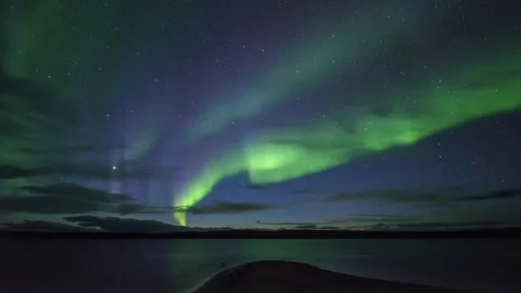 Bands of aurora on violet sky Stock Footage 250291926