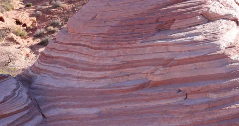 Bands of multicolor on rock formation-Closeup-Tilt up Stock Footage 237765773