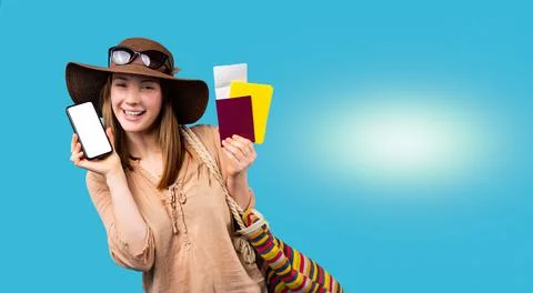 Baner with empty side space. Happy girl shows her passport, air ticket and Stock-Fotos