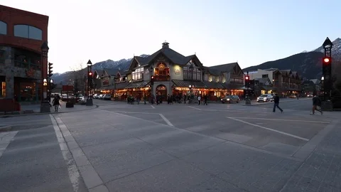 Banff, Alberta, Canada 24. March 2019. Banff avenue gets busy again after winter Stock Footage 123169163