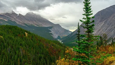 Banff Massive Mountain Valley Ice road Sprawling Overlook Raining Time Lapse Stock Footage 132548248