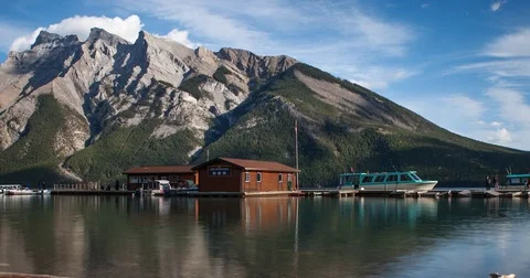 Banff National Park, AB, Canada - Lake Minnewanka boat pier - Timelapse zoom out Stock Footage 75284298