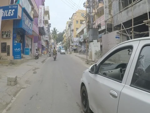 BANGALORE, INDIA - CIRCA 2017 - Speeding through traffic in Bangalore Stock Footage 84009631