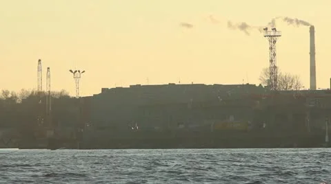 Banging river in sunset with smoking chimney Stock Footage 10860944