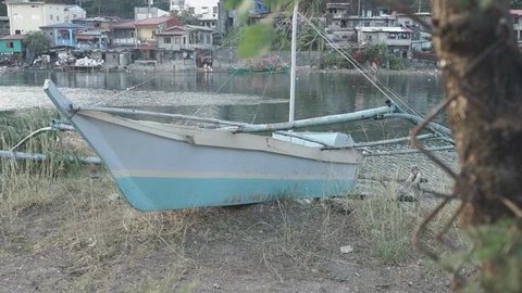 Bangka, small fishing boat parked near the river of Olongapo City, Philippines Stock Footage