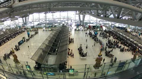 Bangkok airport check-in counters crowded by passengers, timelapse, wide view Stock Footage 10871445
