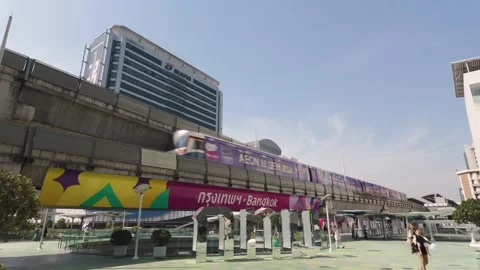 Bangkok BTS skytrain passing through National Stadium station in Bangkok city 動画素材 300574100