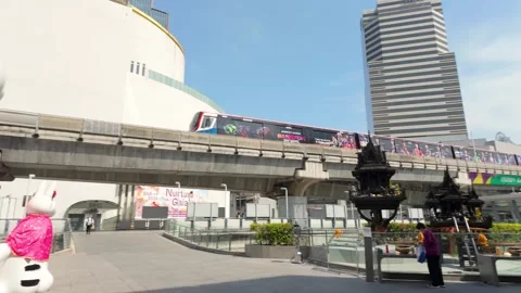Bangkok BTS skytrain passing through National Stadium station Stock-Footage 319926500