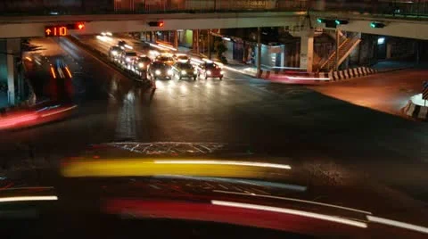 Bangkok intersection traffic at night Stock Footage 22126840