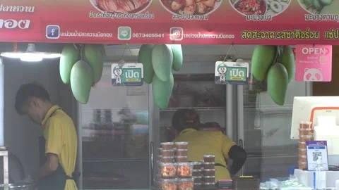 Bangkok - Mango store front vendor seller shop view. Local business concept Stock Footage 249443429