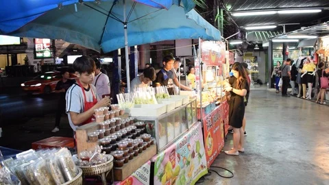 Bangkok street food far view during the night Stock Footage
