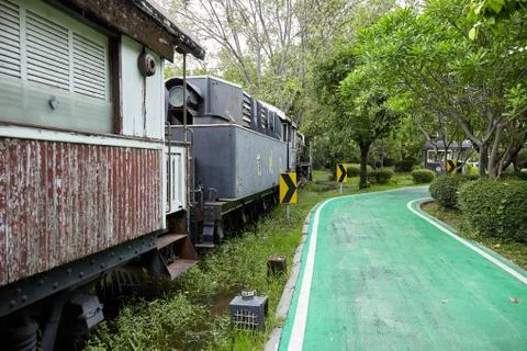 BANGKOK, THAILAND - APRIL 7, 2018: Abandoned old train in the city park Stock Photos