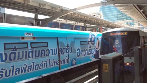 BANGKOK, THAILAND - CIRCA March 2017: Metro overground subway train arriving at Stock Footage