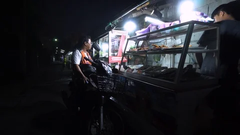 Bangkok Thailand Passage Shops Buffets After Sunset POV Stock Footage 103672516