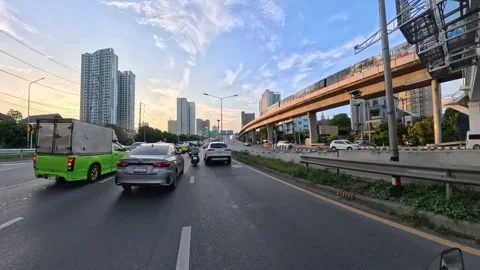 Bangkok Traffic with BTS Skytrain on Elevated Railway, Thailand Stock Footage 344605403