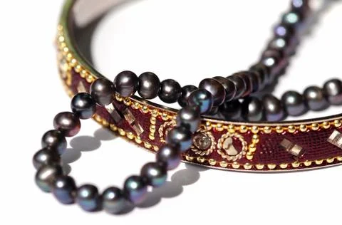 Bangle and pearls Stock Photos