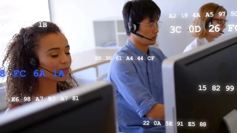 Bank agents taking calls while hex codes scrolling across monitors and covering Stock Footage 333632208