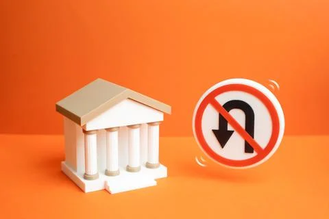 The bank and the symbol of impossibility of return. Refusal to refund money.  Stock Photos