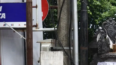 Bank BCA atm logo on the roadside, Denpasar, Bali, October 1, 2021 Stock Footage 164035198