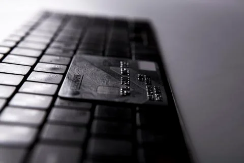 Bank card on a keyboard Stock Photos