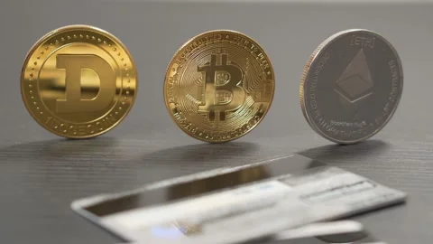 Bank cards fall in front of cryptocurrencies and knock down the Bitcoin Video stock 165154285