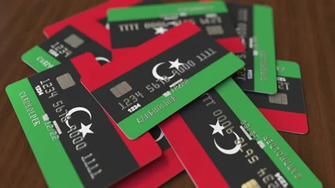 Bank cards with flag of Libya Stock Footage 139868051