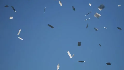 Bank cheques start falling from the sky. Stock Footage 288453872